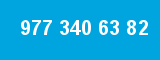 977 340 63 82
